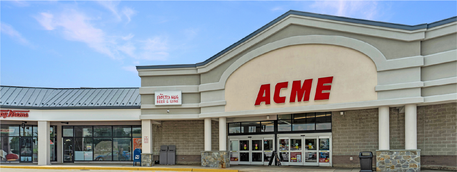 Manoa shopping center overview with ACME store